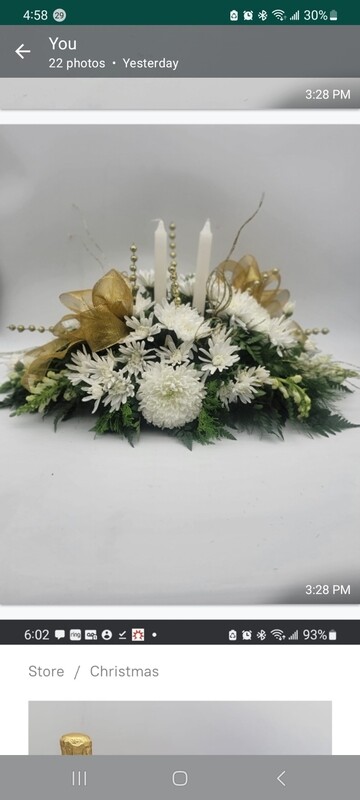 All white Christmas table arrangement
