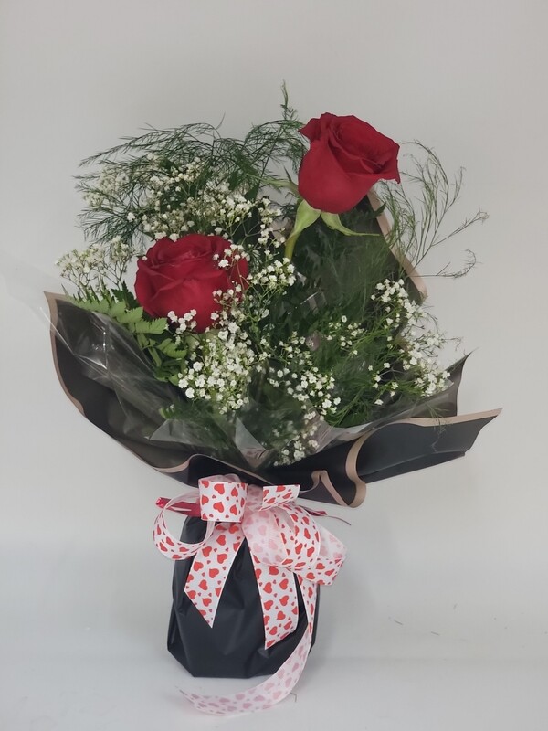Roses - 2  red in a black wrap