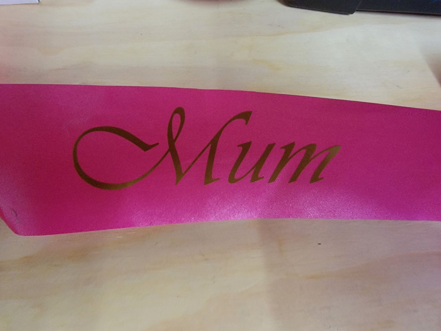 MUM sash