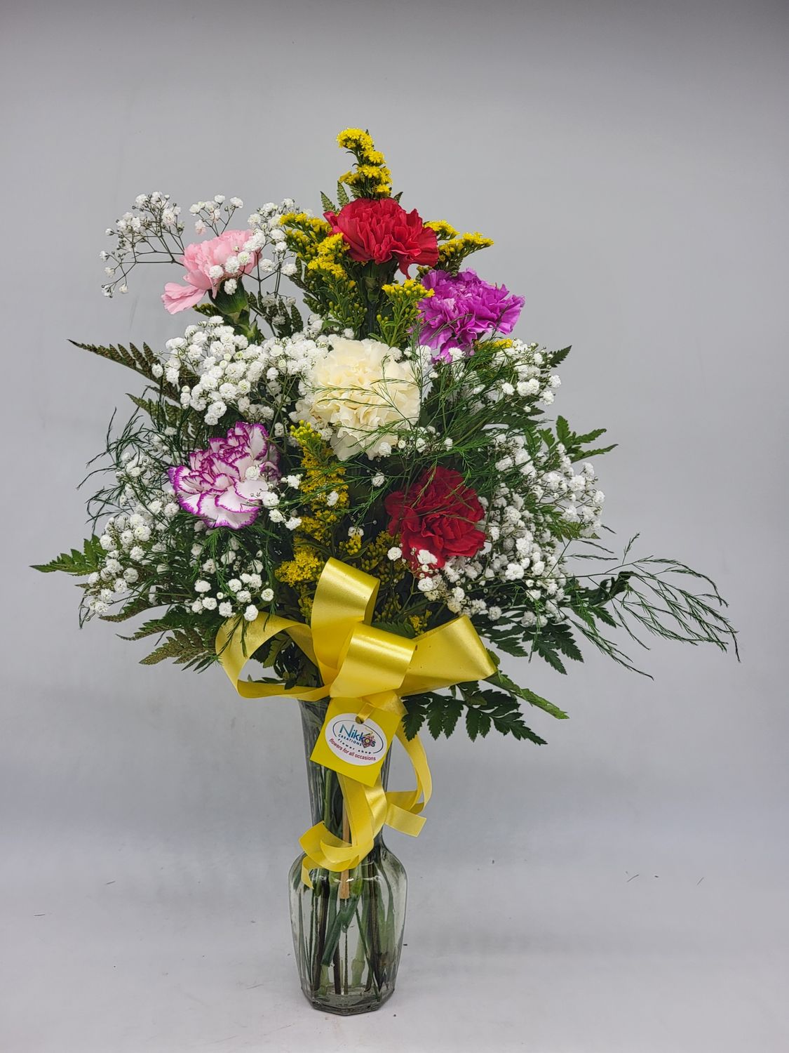 6 multi colour Carnations in a Vase