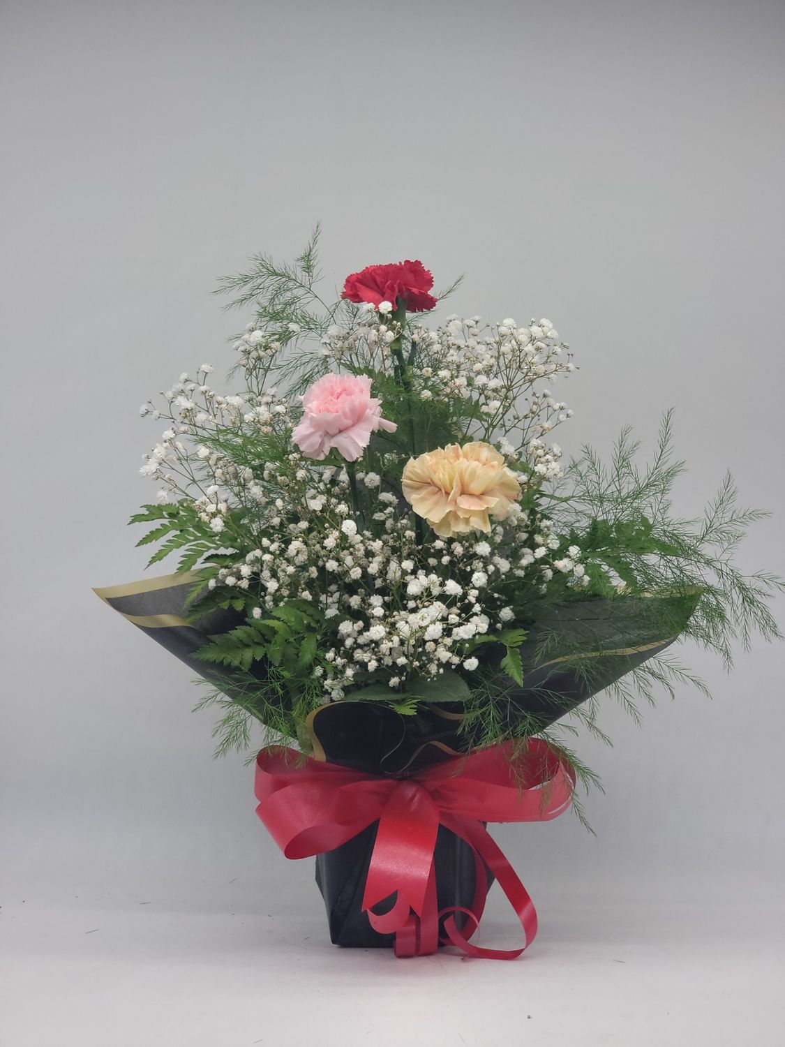 Carnations - 3 in a black wrap