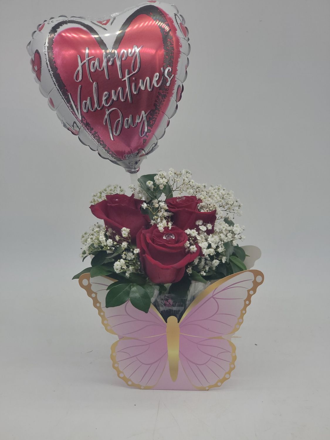Valentines 3 roses in a butterfly with a balloon