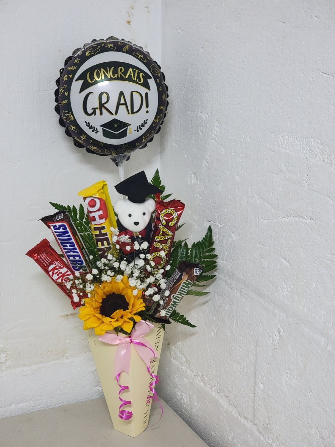 Chocolate and Sunflower combo with a teddy and balloon