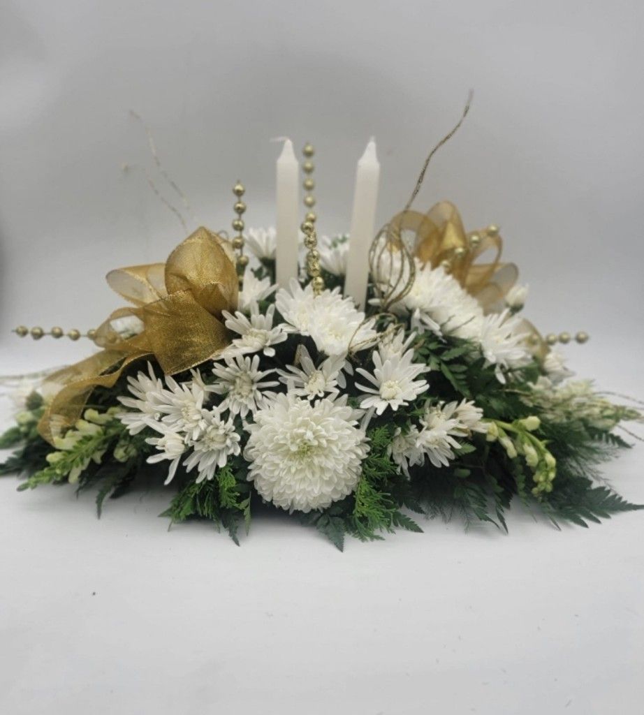 All white Christmas table arrangement