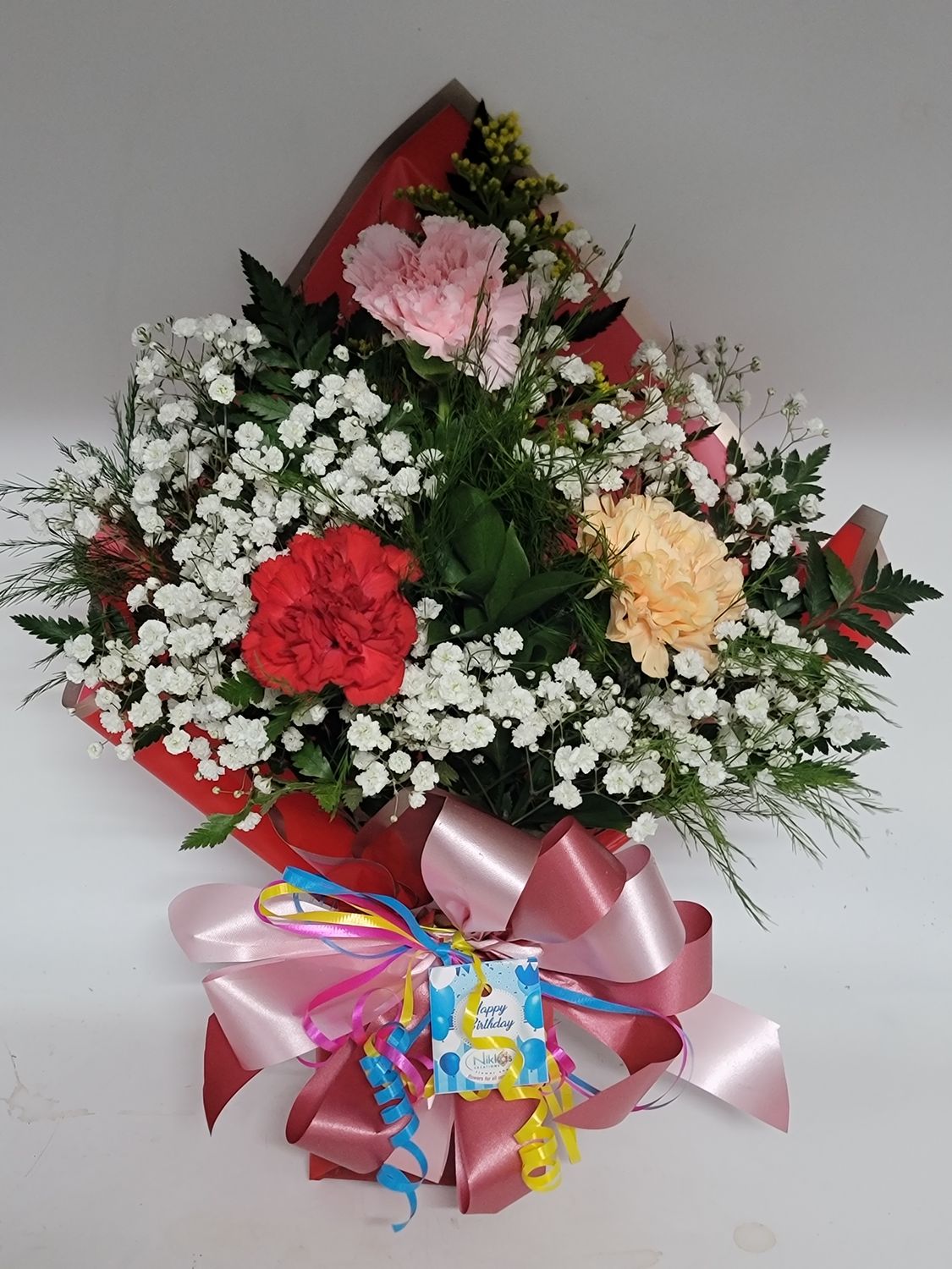 Carnations - 3 in a red wrap