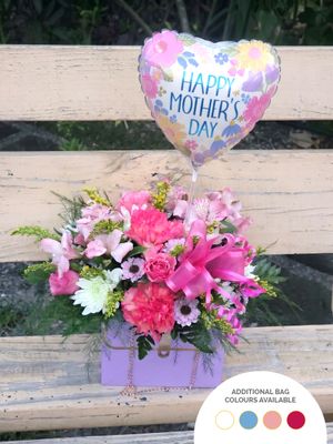 Cut Flowers in a Hand Bag with Chain and Balloon