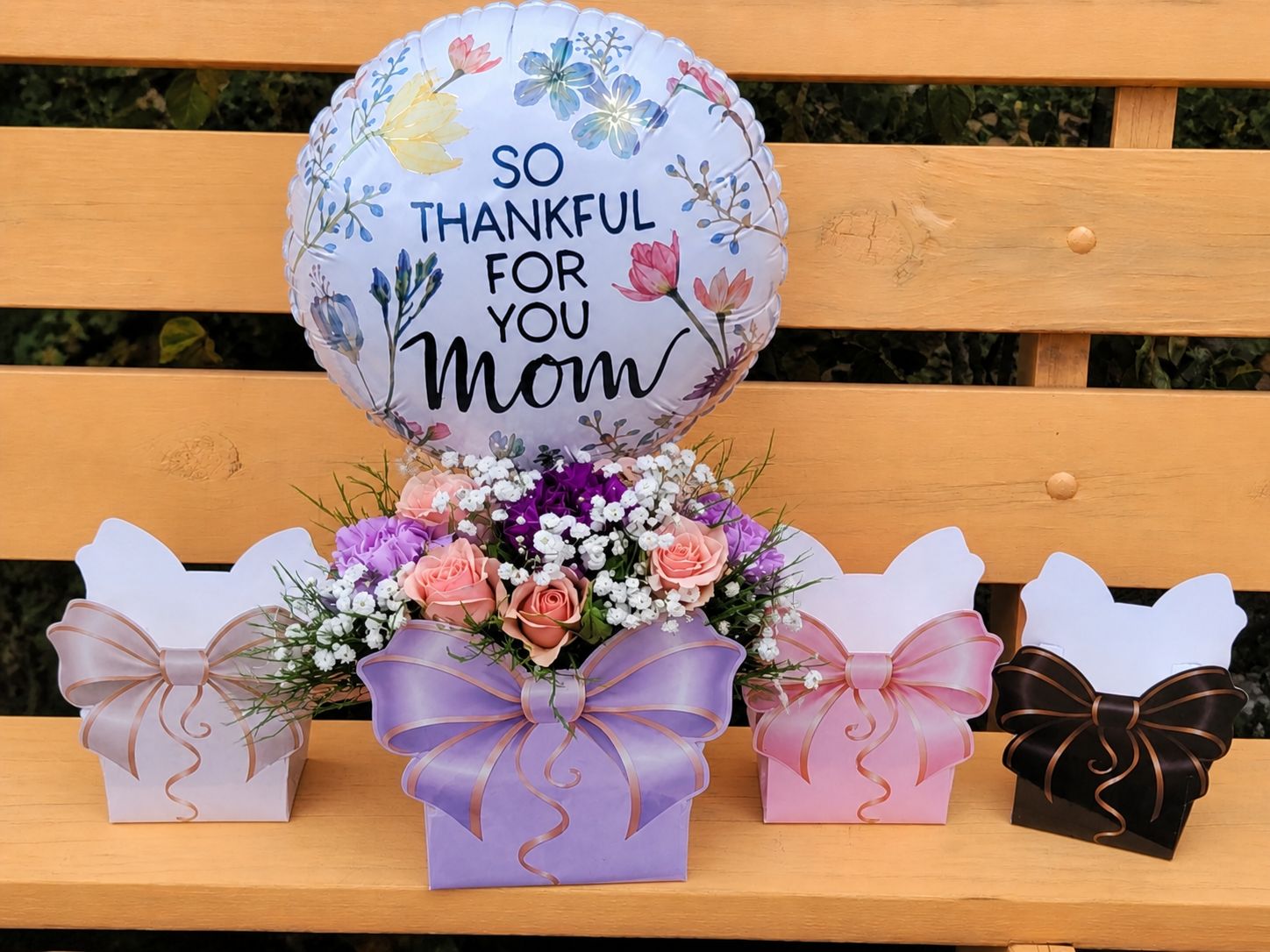 A little box of love for Mom with a balloon