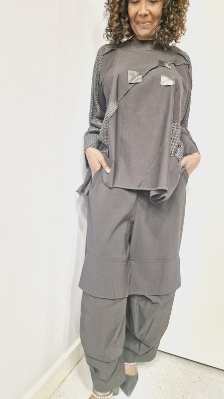 CARACLAN LOOSE CUT TROUSERS