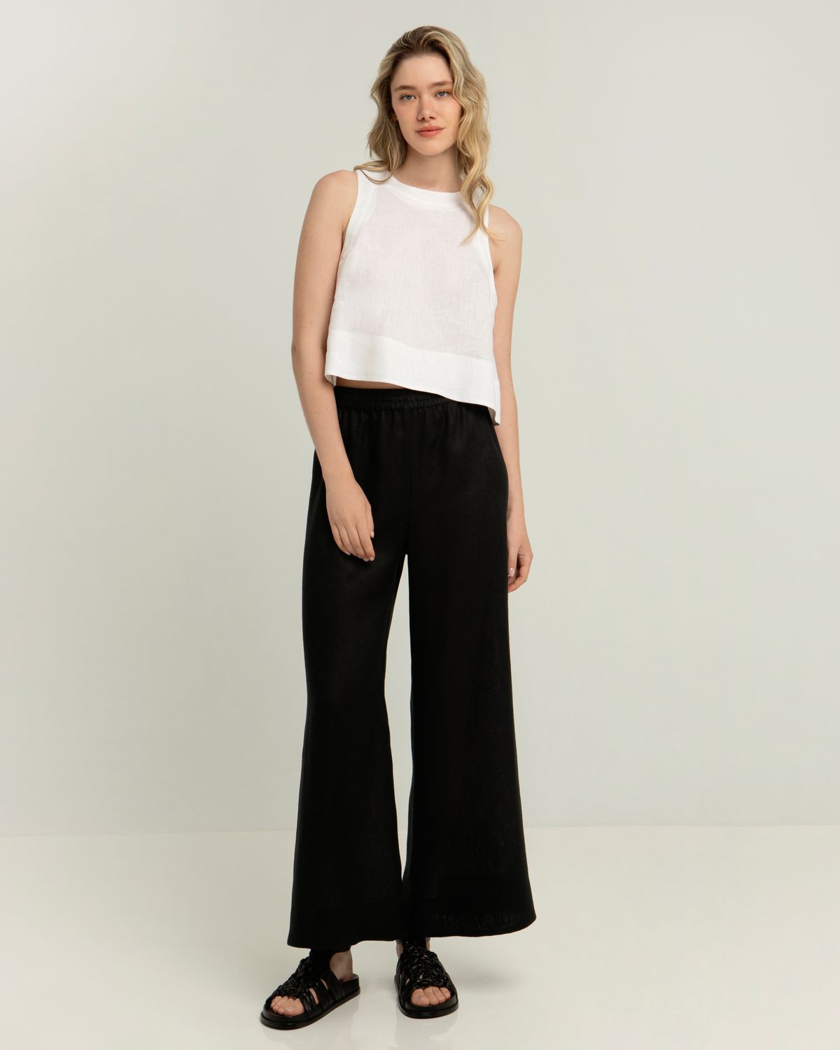 GREEK ARCHAIC KORI FLARED LINEN TROUSERS-BLACK