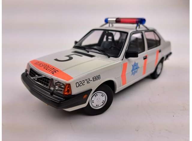 1:18 Triple9 - 1987 Volvo 340 Dutch Police, white/orange/blue