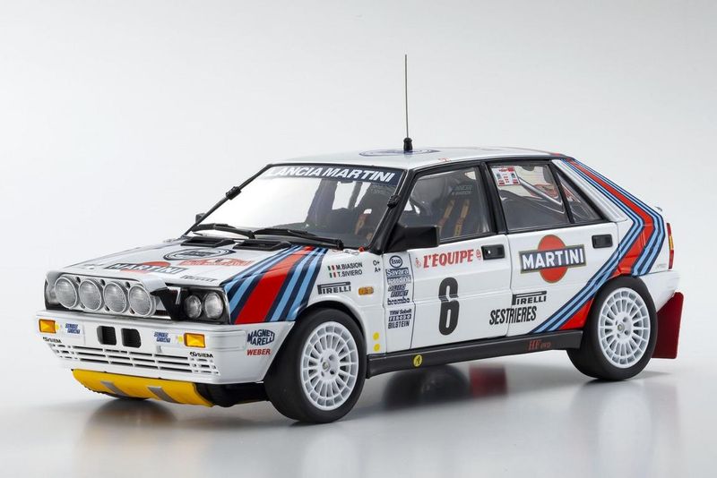 1:18 Kyosho - Lancia Delta HF Integrale 4WD (Night Version) Team Martini Racing #6 Winner Rally Montecarlo 1987 1:18 Kyosho - Lancia Delta HF Integrale 4WD (Night Version) Team Martini Racing #6 Winner Rally Montecarlo 1987