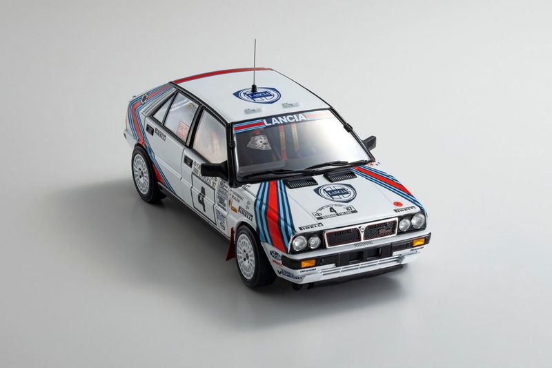 1:18 Kyosho - Lancia Delta HF Integrale 4WD (Night Version) Team Lancia #4 Winner Rally 1000 Lakes 1987 1:18 Kyosho - Lancia Delta HF Integrale 4WD (Night Version) Team Lancia #4 Winner Rally 1000 Lakes 1987