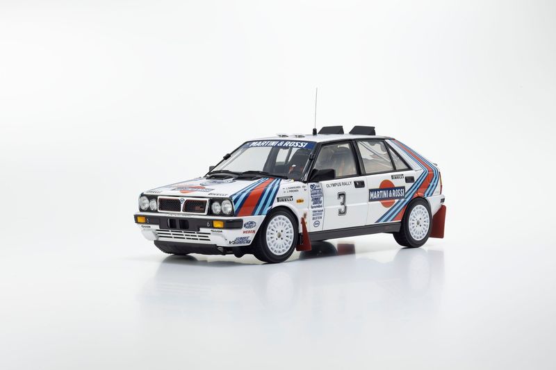 1:18 Kyosho - Lancia Delta HF 4WD #3 1:18 Kyosho - Lancia Delta HF 4WD #3 "MARTINI & ROSSI" Winner 1987 Olympus Rally - Juha Kankkunen - Juha Piironen