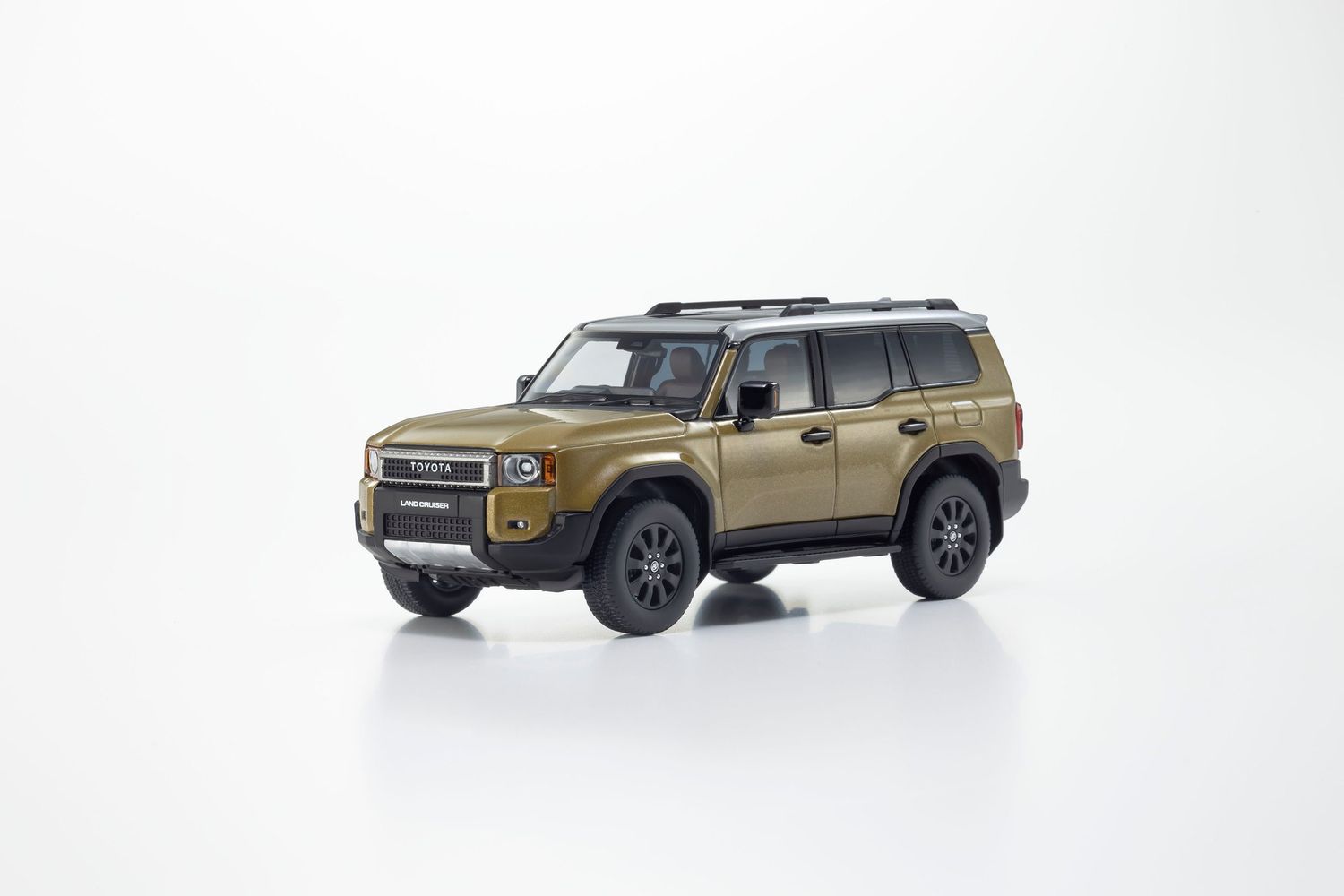 1:43 Kyosho - Toyota Land Cruiser 250 ZX First Edition Sand/Light Gray