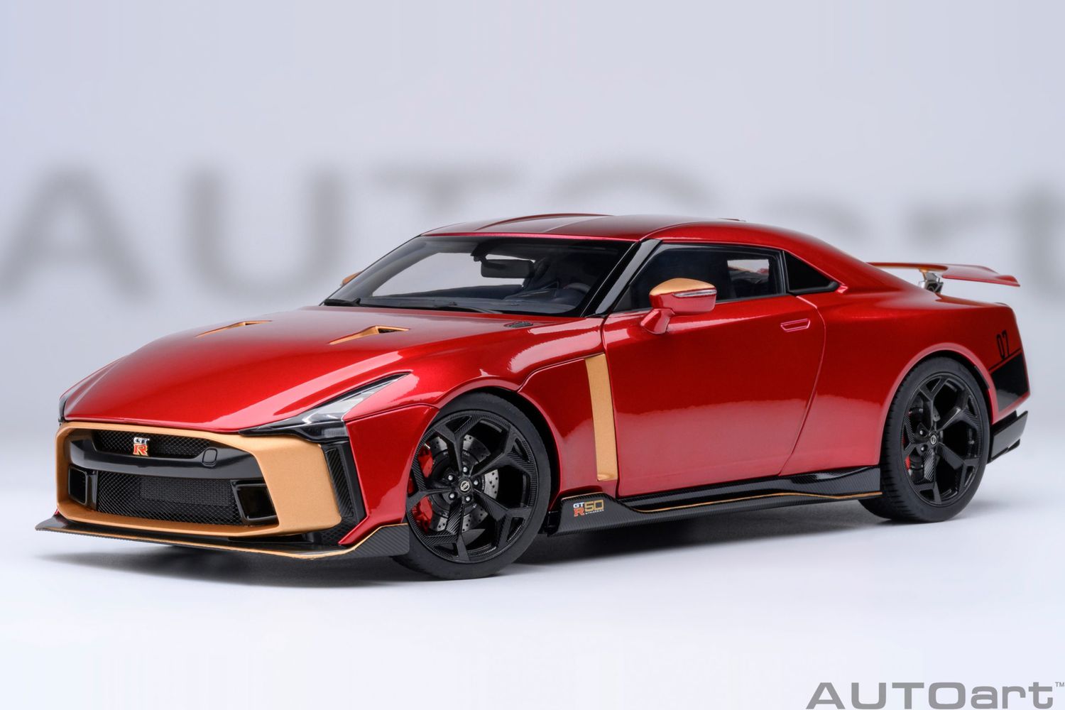 1:18 Autoart - Nissan GT-R50 by Italdesign (Metallic Red/Gold)