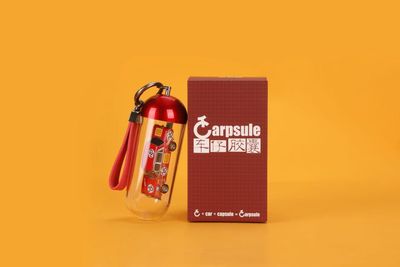 1:64 Sunstar Merchandise - Turning Crush Carpsule, red *Car not included*