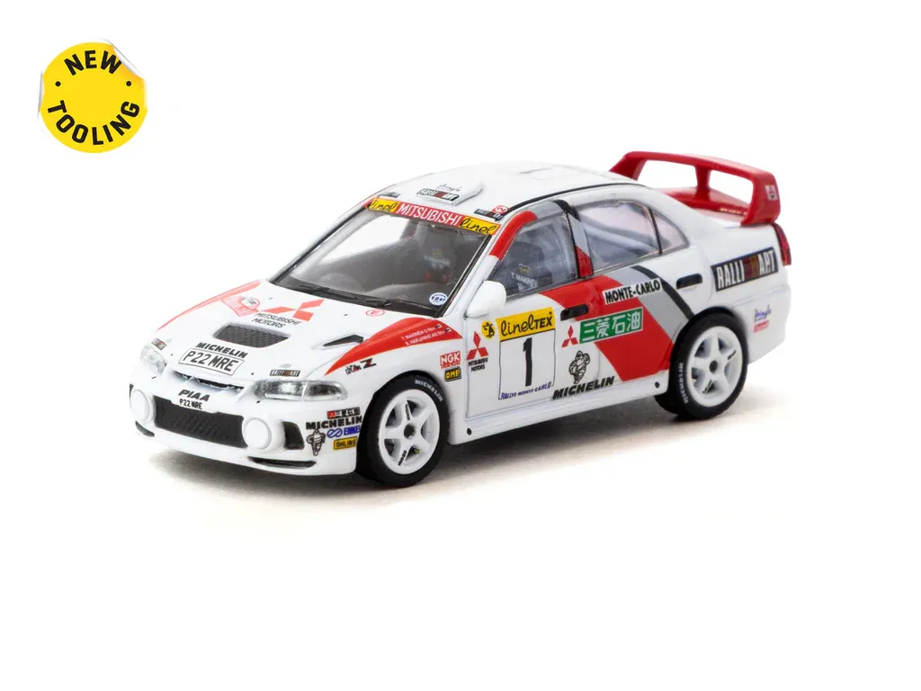 1:64 Tarmac - 1997 Mitsubishi Lancer Evolution IV Rallye Monte-Carlo #1 Tommi Mäkinen/Seppo Harjanne 1:64 Tarmac - 1997 Mitsubishi Lancer Evolution IV Rallye Monte-Carlo #1 Tommi Mäkinen/Seppo Harjanne