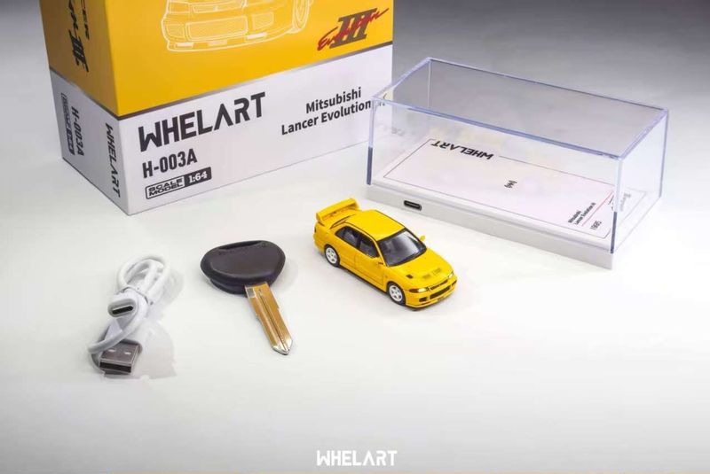 1:64 Whelart - Mitsubishi EVO 3 Light-up, yellow (Light-up)