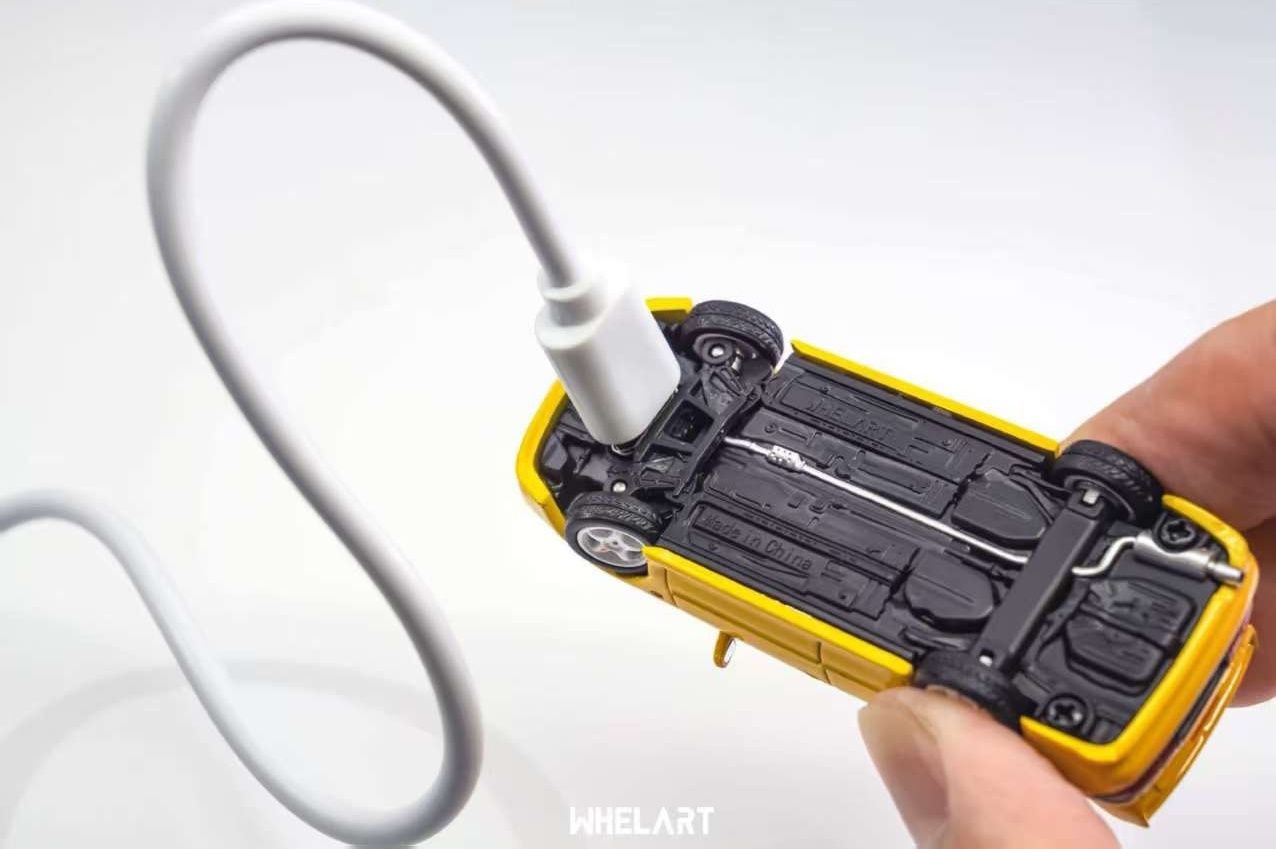 1:64 Whelart - Mitsubishi EVO 3 Light-up, yellow (Light-up)