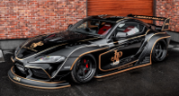 1:18 Solido - 2025 Toyota GR Supra Liberty Walk Body Kit Black/Gold Tribute
