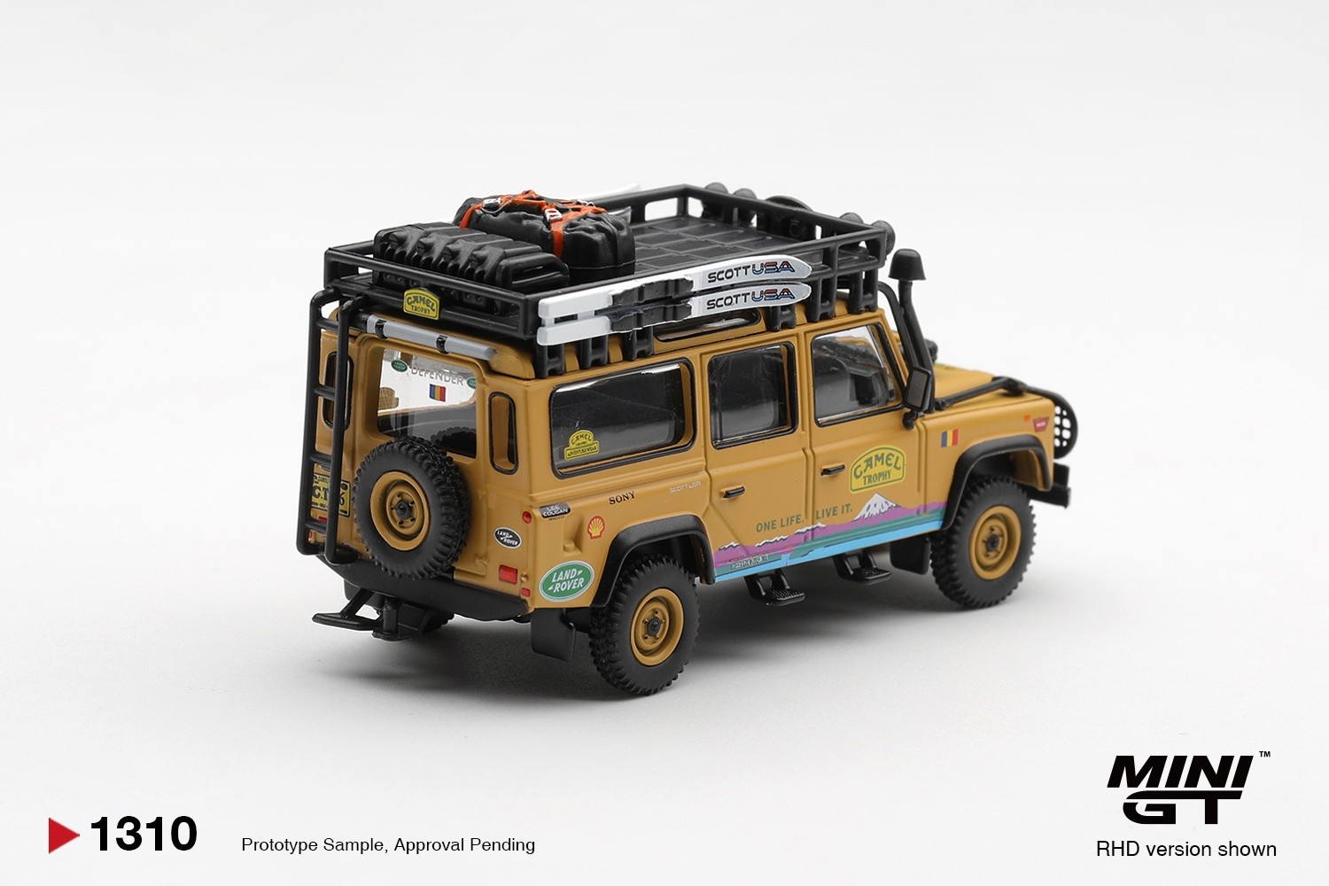 1:64 Mini GT - 1998 Land Rover Defender 110 *Camel Trophy* Team Romania Tierra Del Fuego CT36 *Blister packaging*