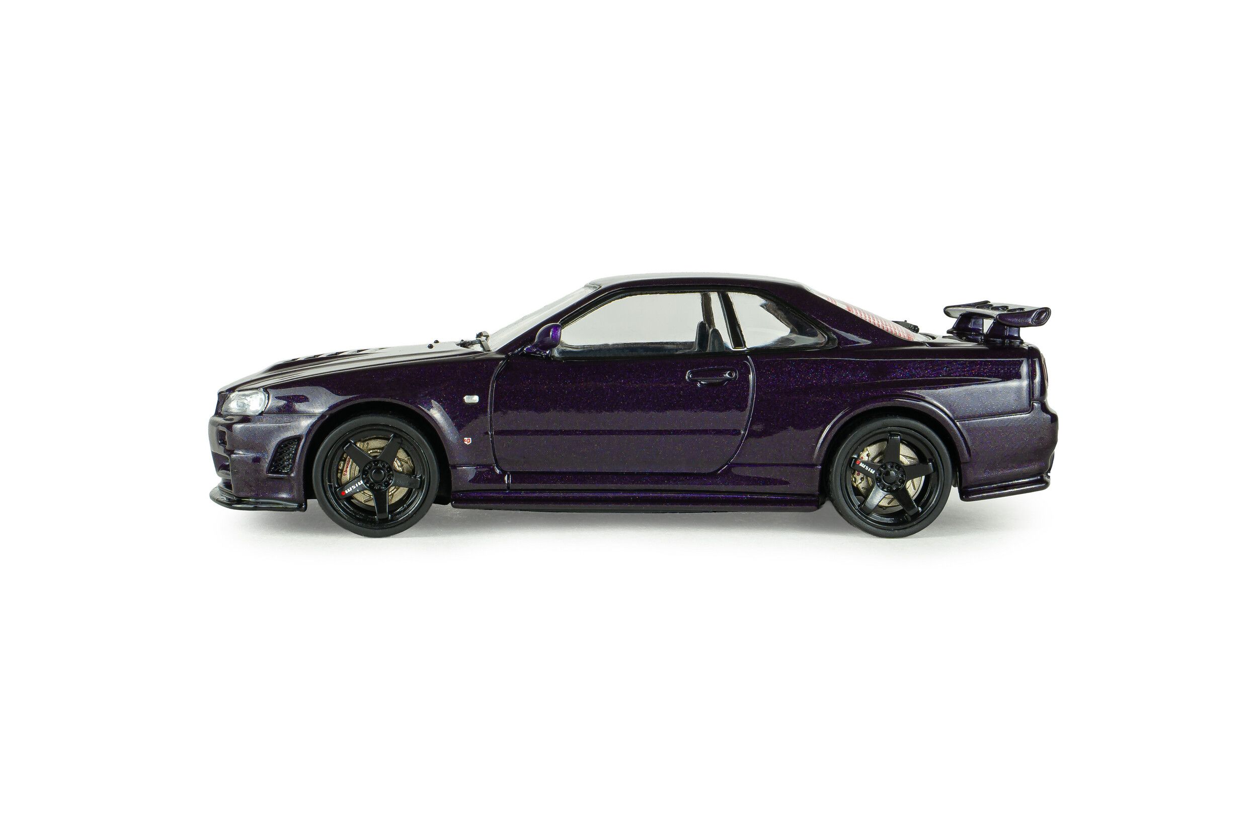 1:43 Solido - Nissan Skyline GT-R (BNR34) with NISMO Parts – Midnight Purple