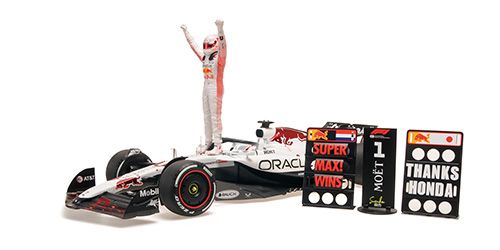 1:12 Minichamps - Red Bull RB21 #1 Oracle Red Bull Racing Japan GP 2025 M. Verstappen – Sieger / With Figure + 2x Pit Board