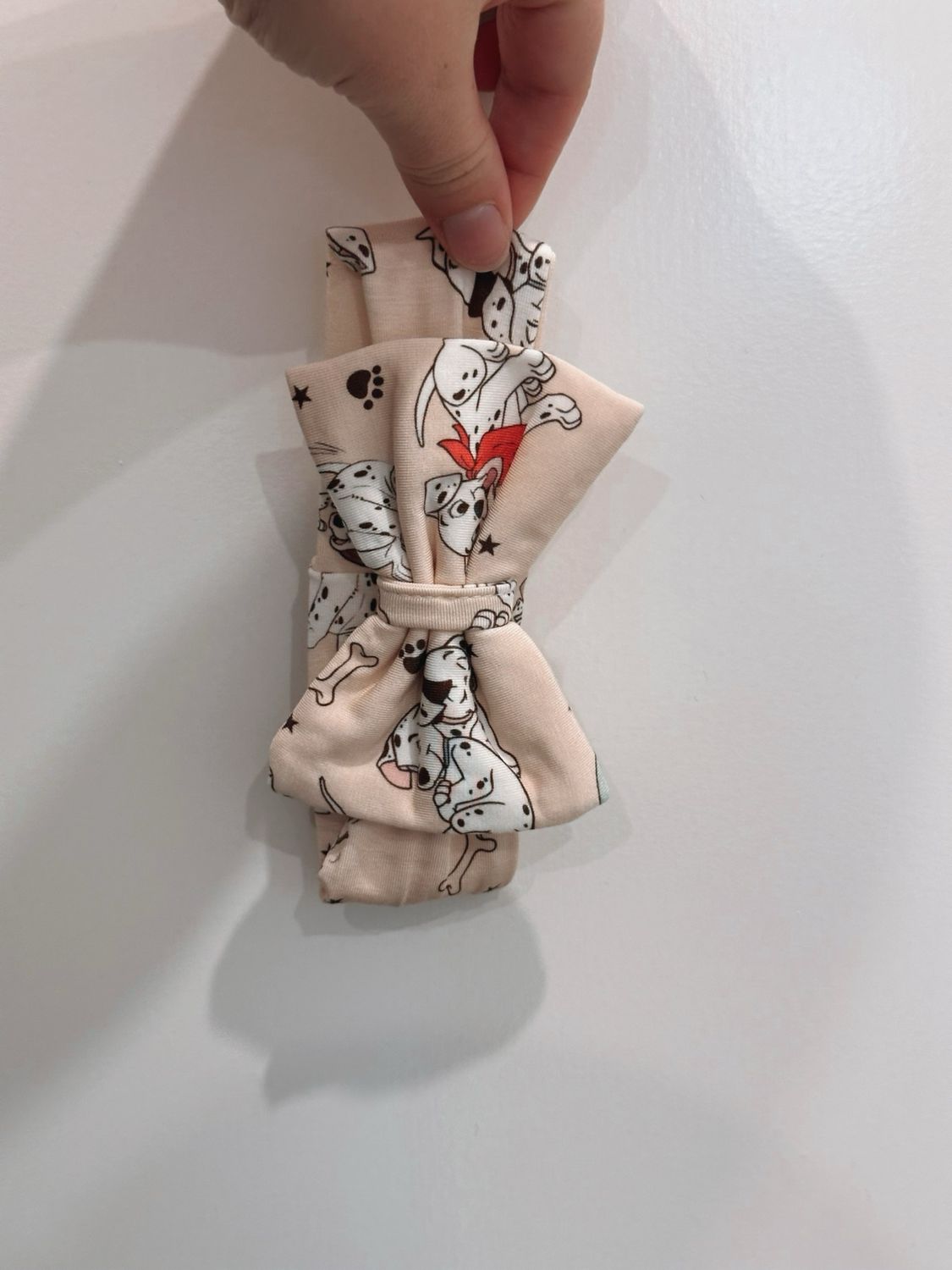 Cuddly Bow in Playful Pups