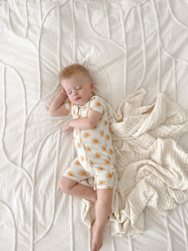 Shortie Cuddly Suit in Neutral Suns Shortie Cuddly Suit in Neutral Suns