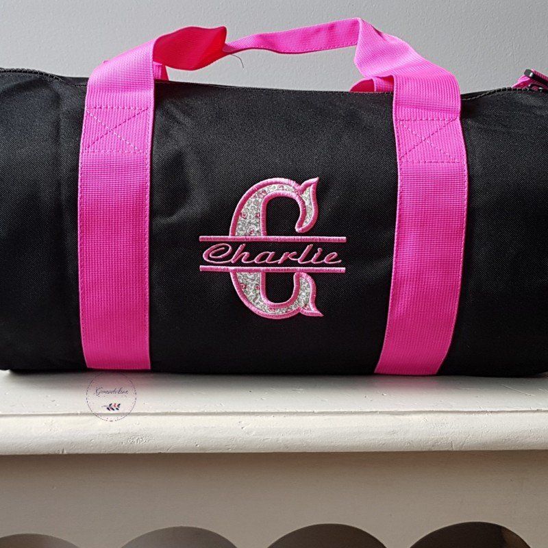 Polochon 20 L Noir anses fuschias