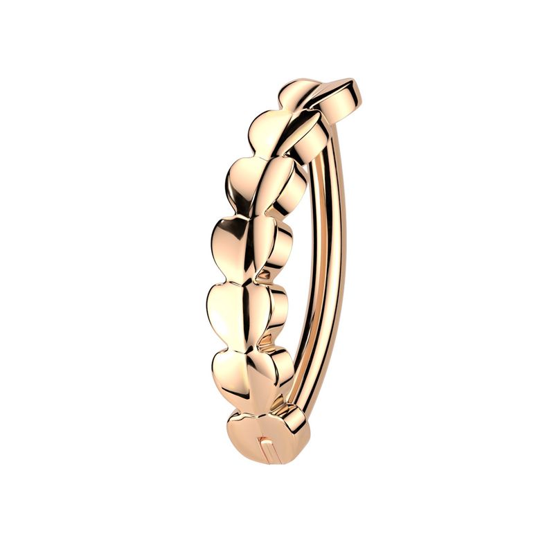 Piercing au nombril anneau cœurs or rose