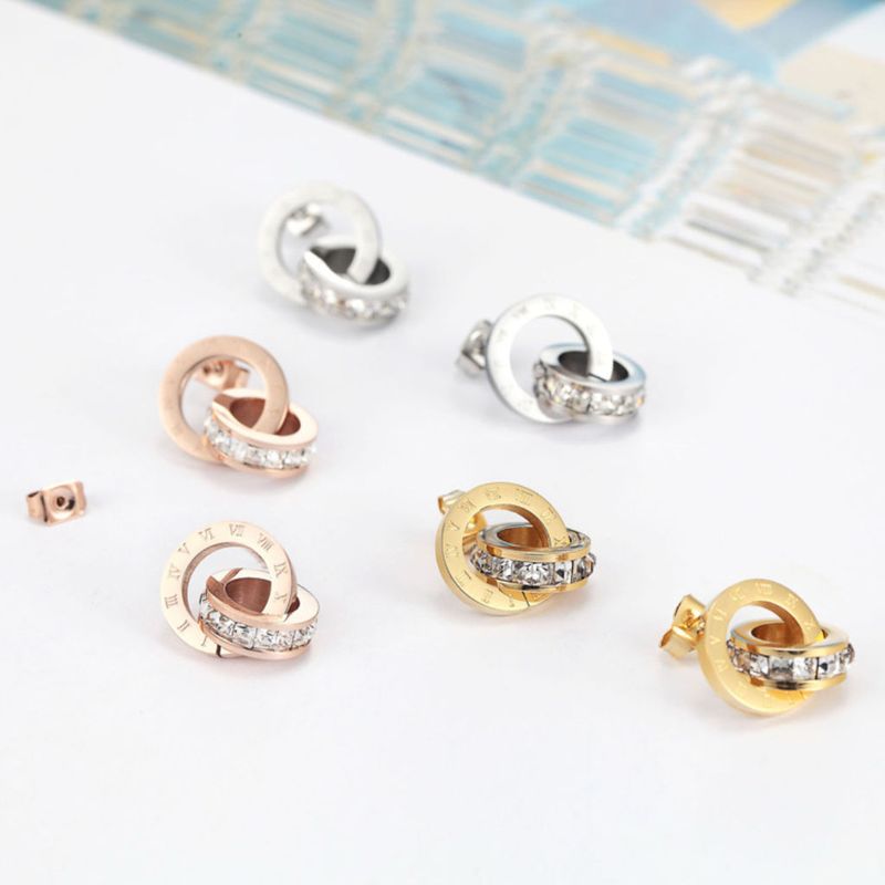 Boucles d’oreilles puces en acier avec chiffres romains gravés