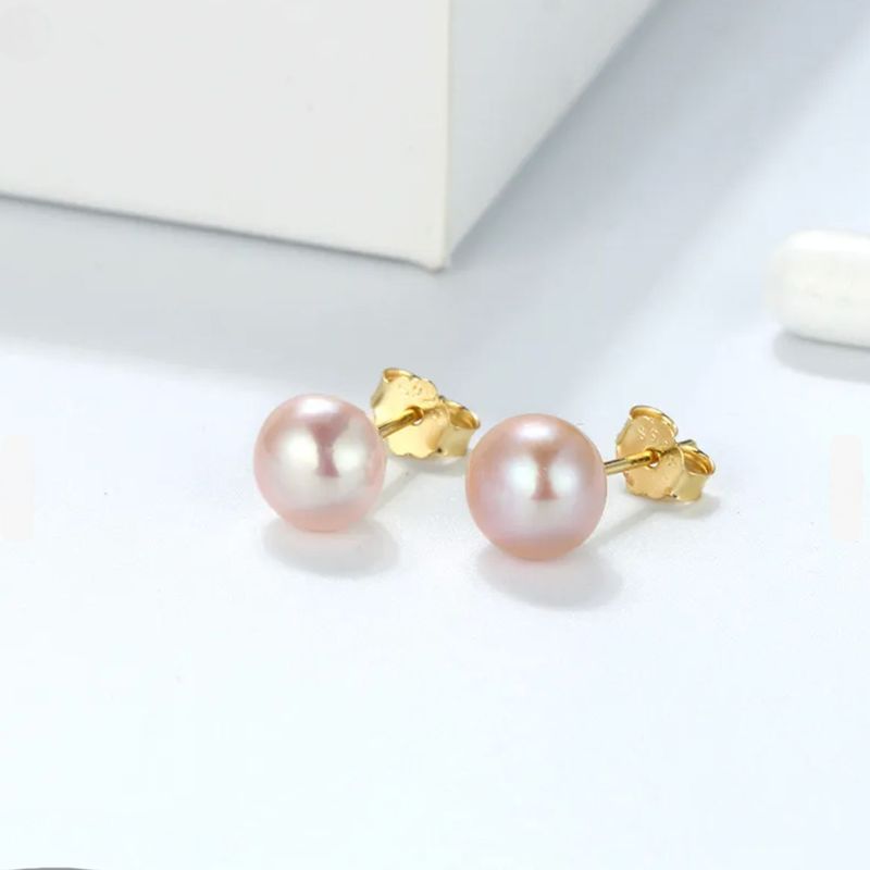 Clous d’oreilles classiques avec perle rose