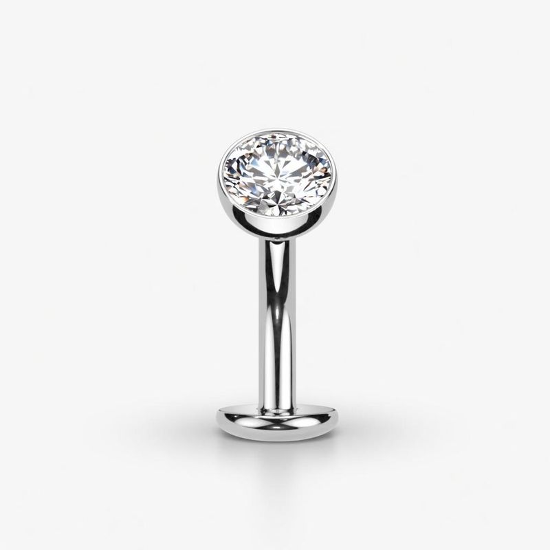 Banane aus Titan mit weissem Kristall