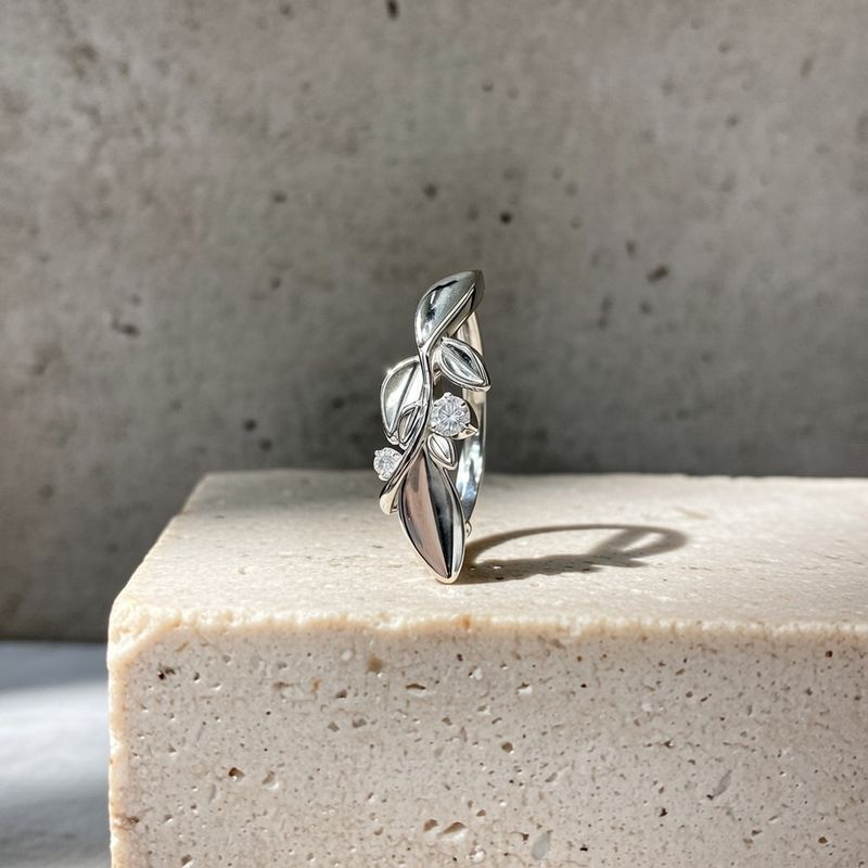 Piercing au nombril anneau feuilles et cristal