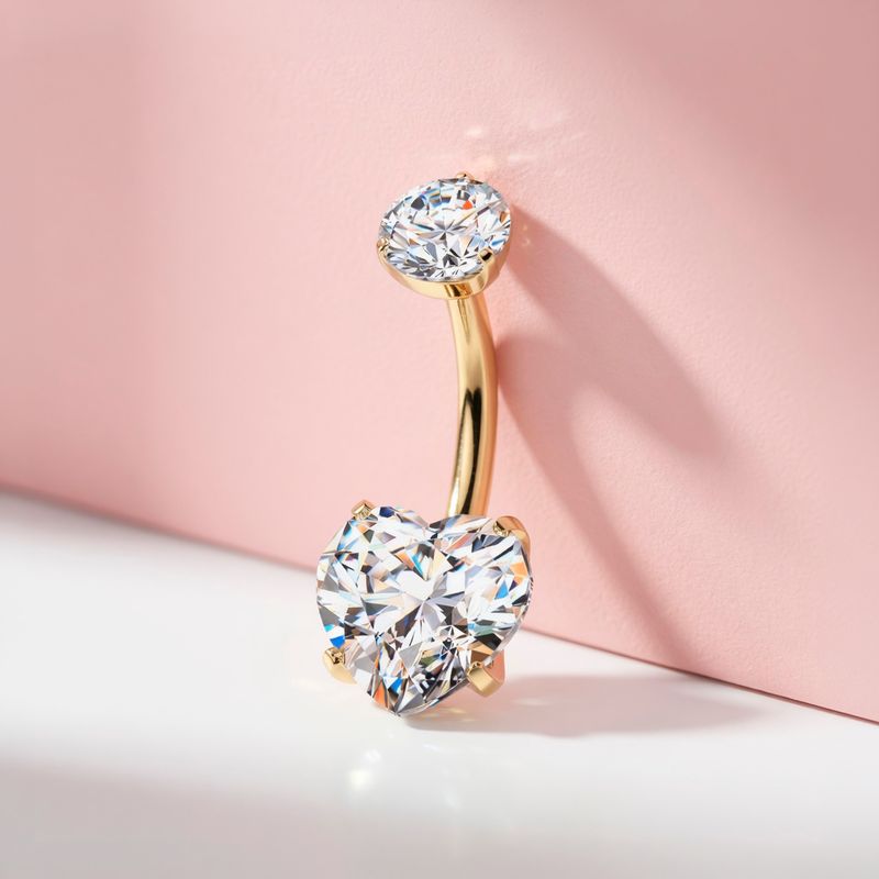 Piercing au nombril en titane avec placage en or 24 carats et cœur blanc