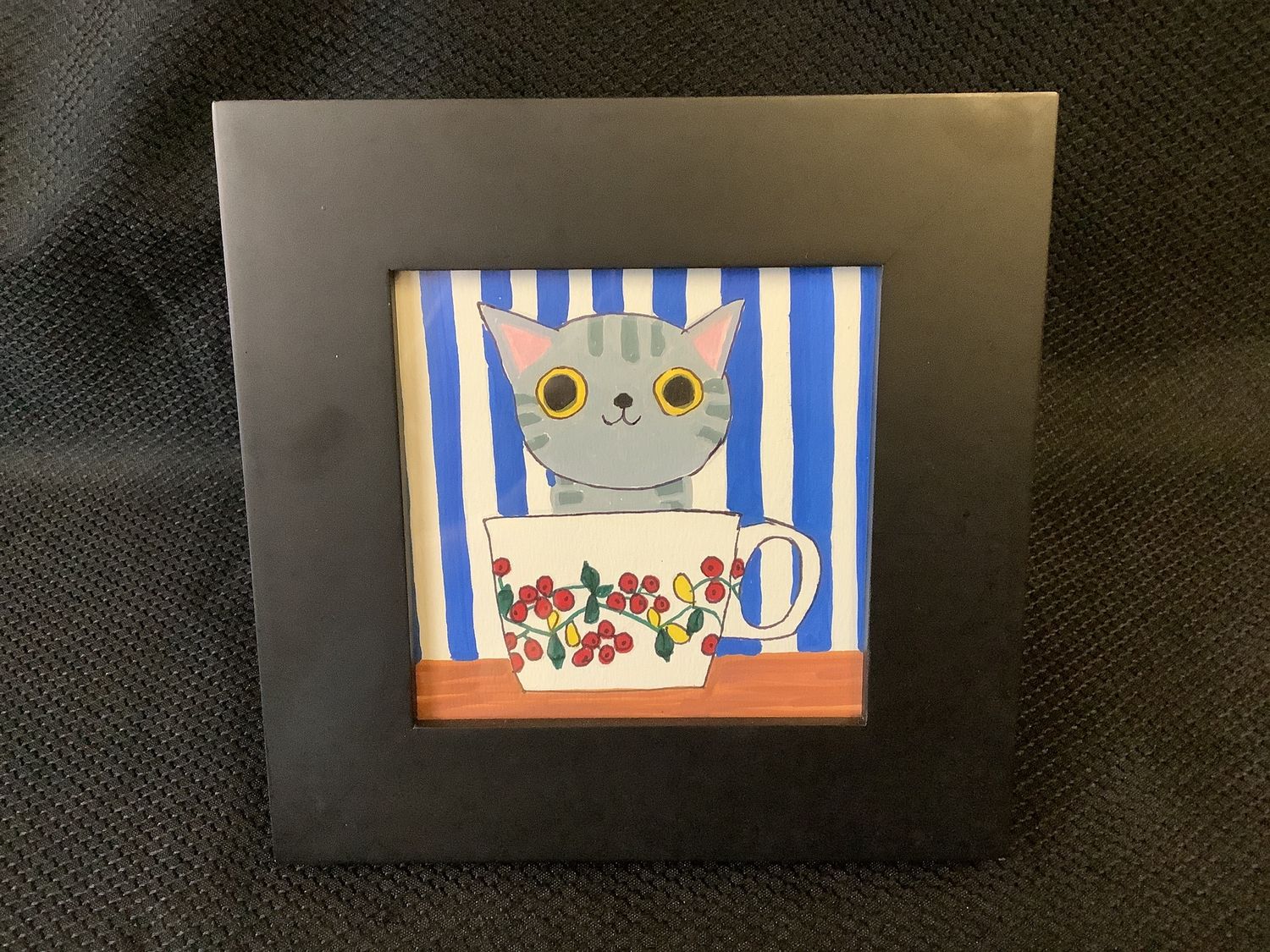 Cat in a Teacup