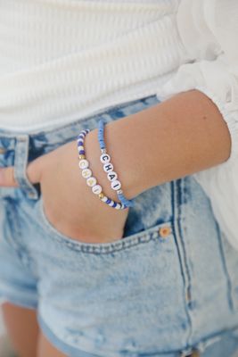 &#39;CHAI&#39; bracelet (Gold Lettering with Blue &amp; White beads)