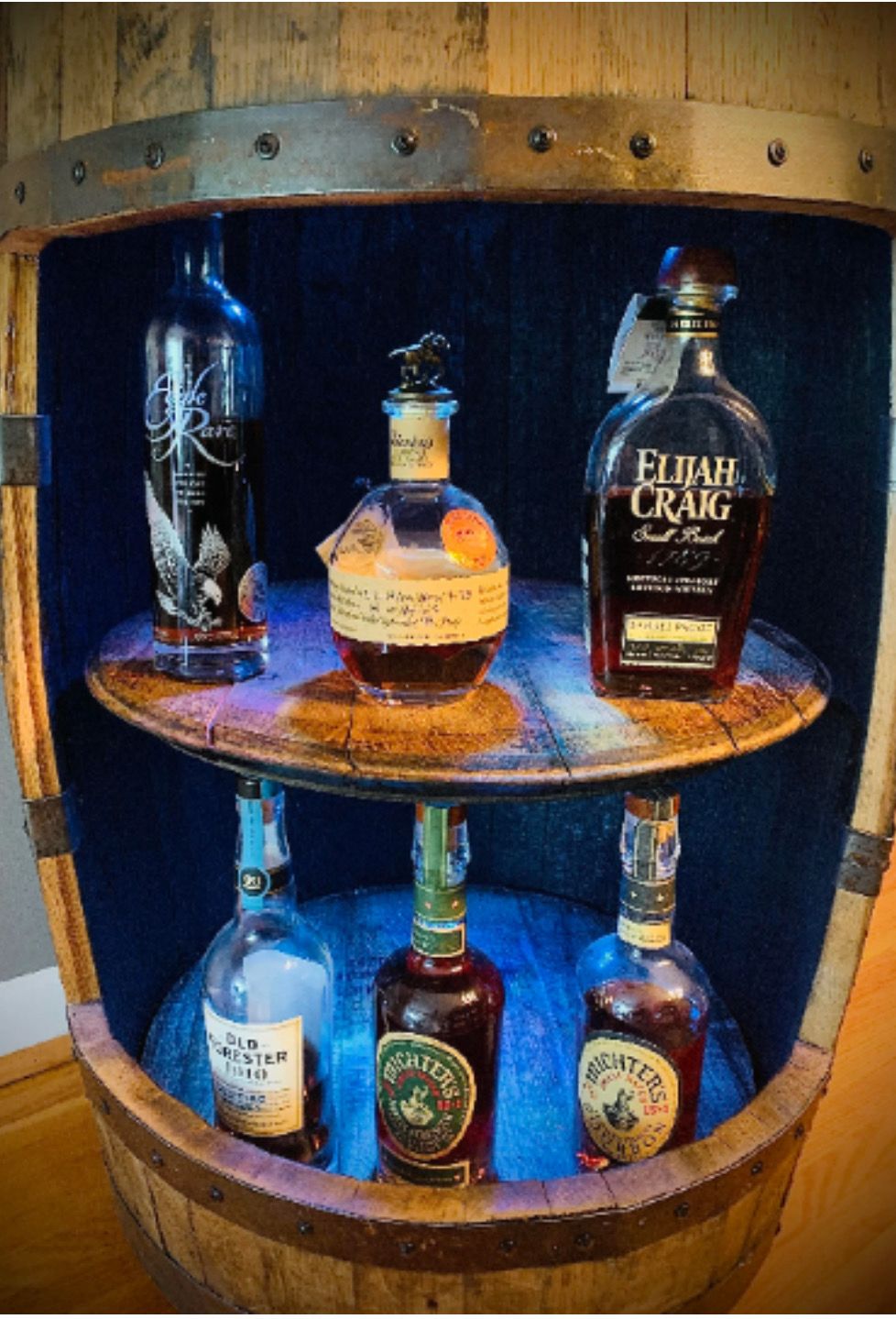 Barrel Cabinet With Dual Lazy Susan Shelves.