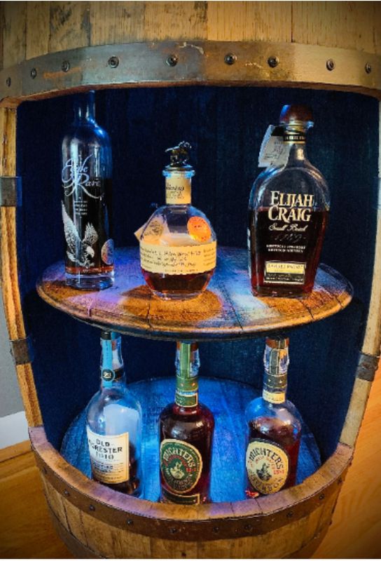 Barrel Cabinet With Dual Lazy Susan Shelves.