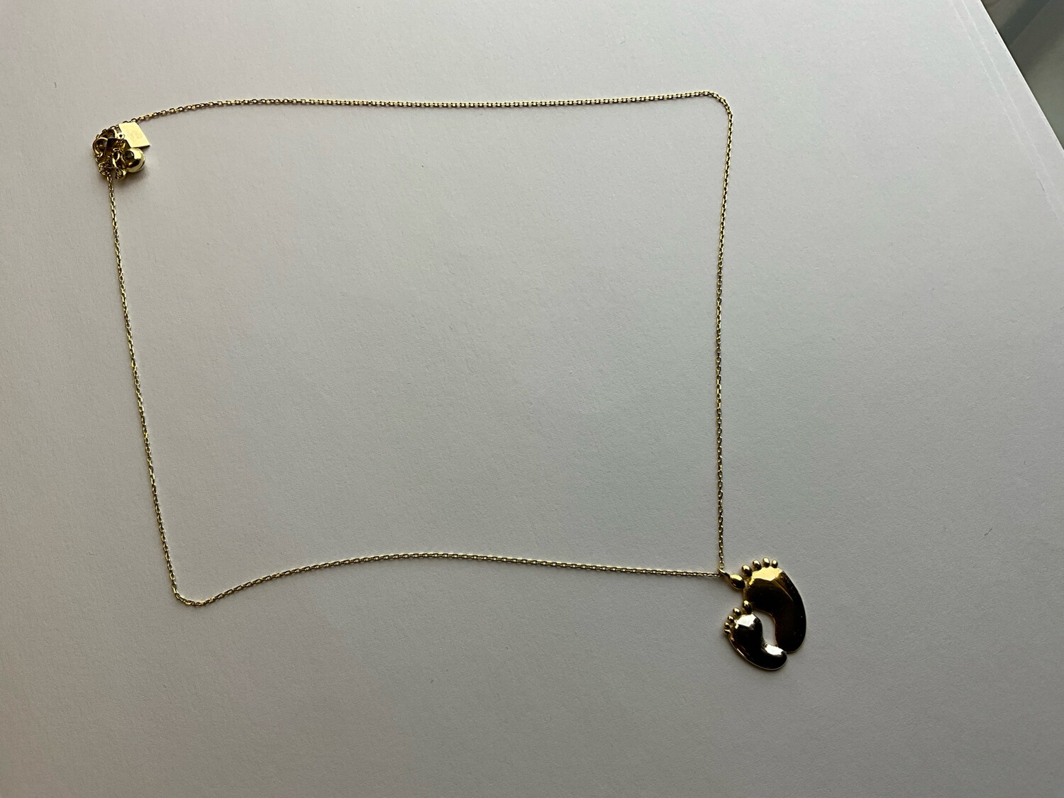 Damen Kette mit Kinder Fußfigur gelb und weiss Gold Länger 48 cm 