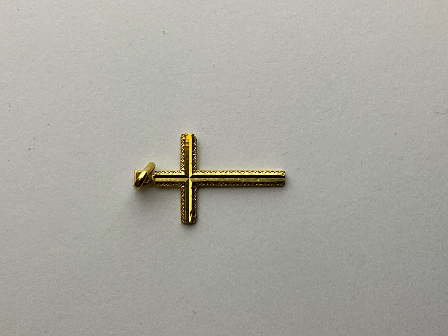 Kreuz uni 18K Gold läng 2.70cm bereit 1.70 Höhe 3.25cm 