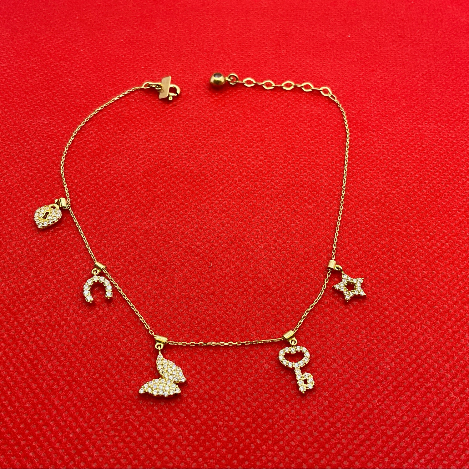 Fusskette mit fünf verschiedenen schönen Anhänger 14K GOLD Länge 26 cm 