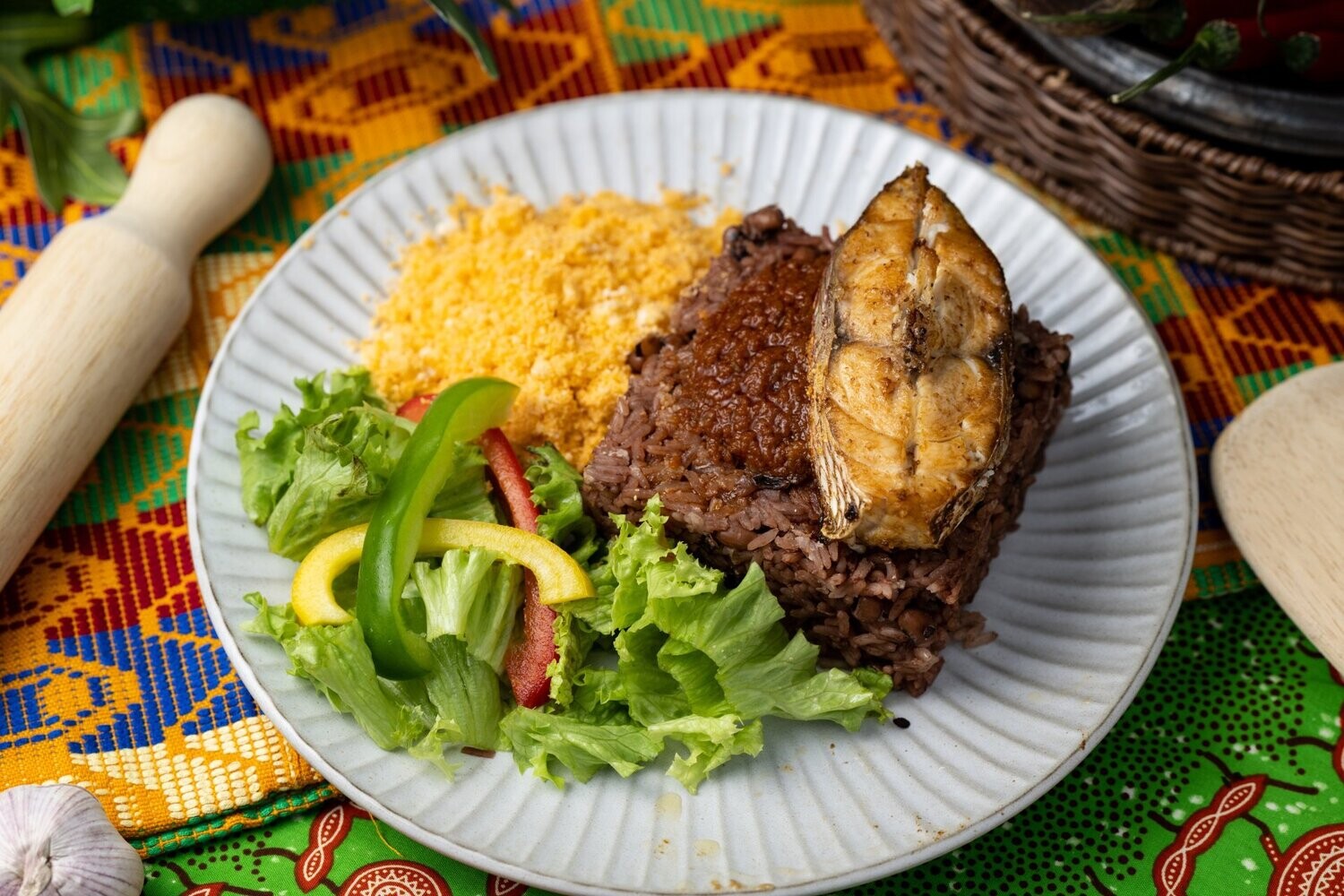 Waakye (Rice cooked with black eye beans and soghum leave)