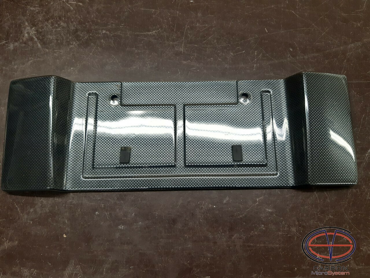 Short number plate panel surround from Carbon Fiber for Celica T23 Short number plate panel surround from Carbon Fiber for Celica T23