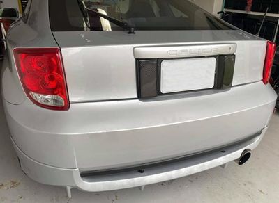 Short number plate panel surround from Carbon Fiber for Celica T23