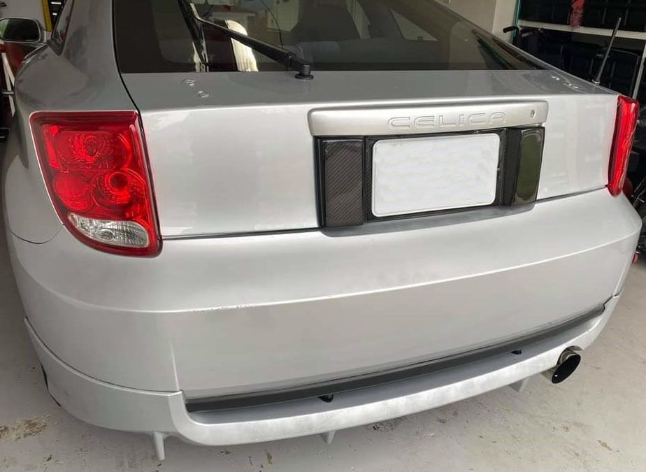 Short number plate panel surround from Carbon Fiber for Celica T23