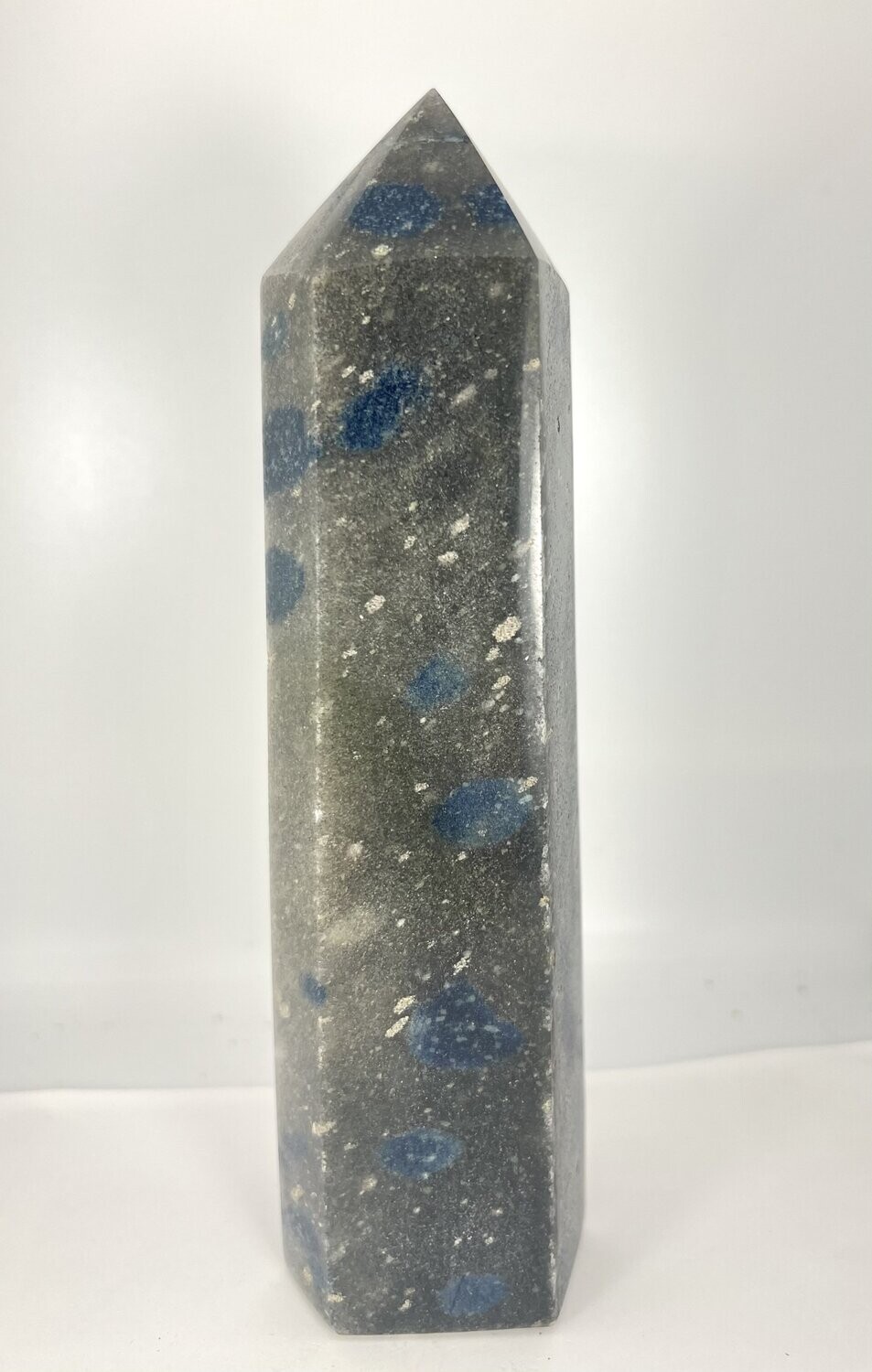 blue spotted gray polished  crystal