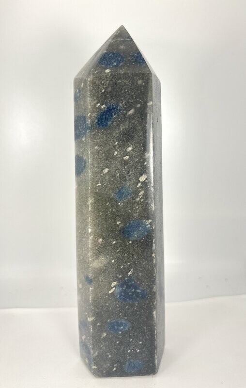 blue spotted gray polished  crystal