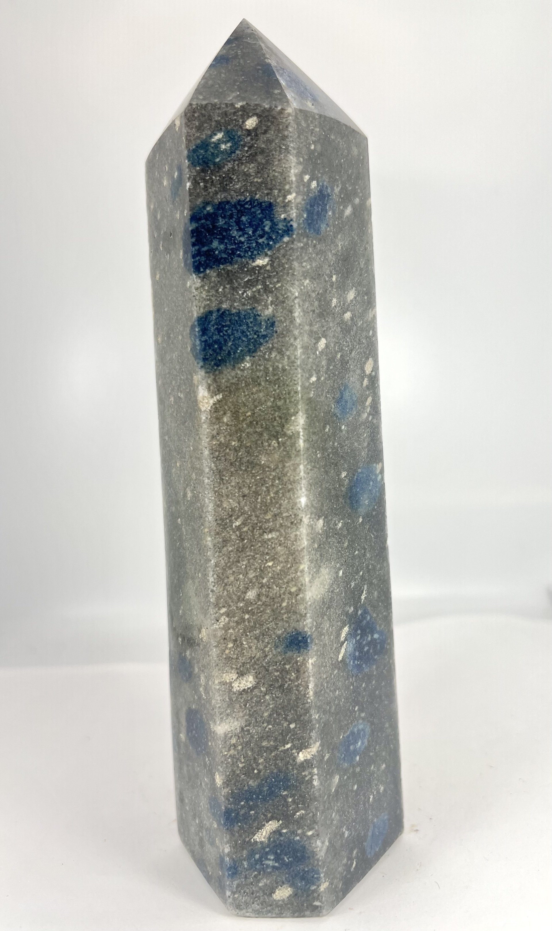 blue spotted gray polished  crystal
